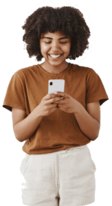 entertained cute happy african american teenage girl with afro hairstyle brown t shirt holding smartphone laughing funny video internet using device h